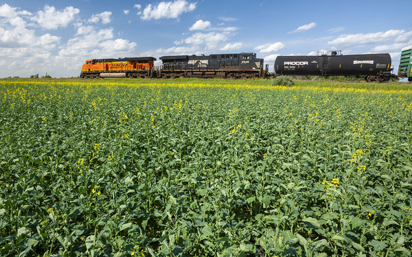 Locomotives Pulling Tanker Cars by Dave Reede Photohgraphy