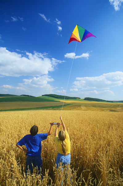 children Flying kite by Dave Reede Photohgraphy