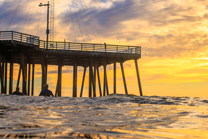 water surfer sunset