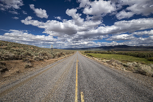 Old Highway and Puffy Clouds
