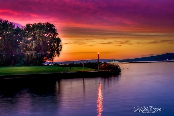 The old Ithaca Sunset on the canal  by Joseph Scaglione III