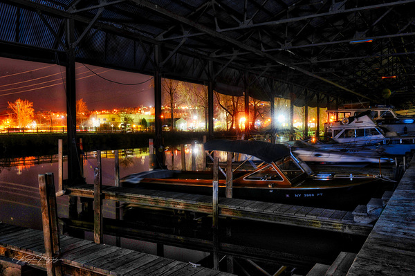 Boats in the boathouse Ithaca NY by Joseph Scaglione III