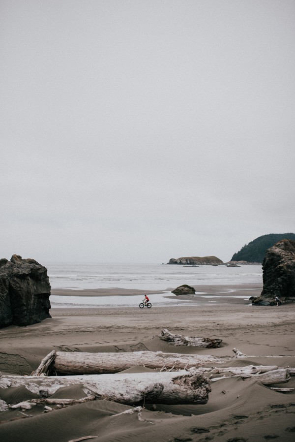 Cyclist on the beach Print