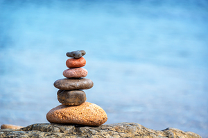 Pile of beach pebbles balanced stones still life