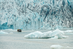 Zodiac boat in Fjallsarlon glacier lagoon Iceland
