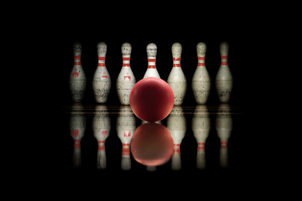 Bowling strike bowl and pins