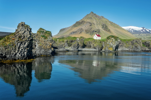 Little white house in Arnarstapi Iceland