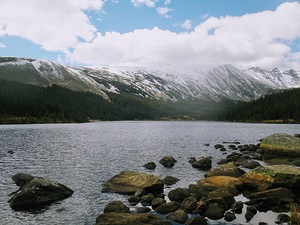 Clouds Over Snow Dusted Mountains
