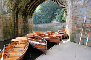 Rowing boats underneath the Mediaeval Elvet Bridge Durham England