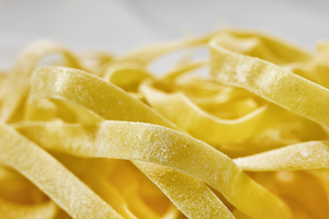 Raw fettuccine pasta detail