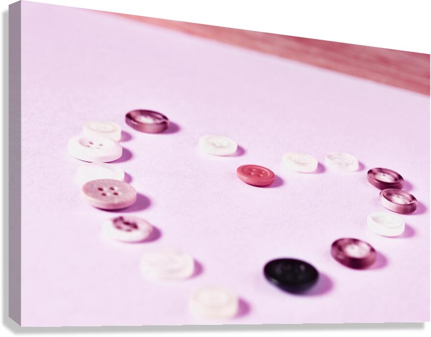Heart shape with colored buttons Canvas Print