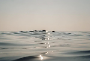 Minimalist Ocean Surface with Soft Reflections