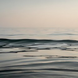 Minimalist Ocean Surface with Soft Reflections