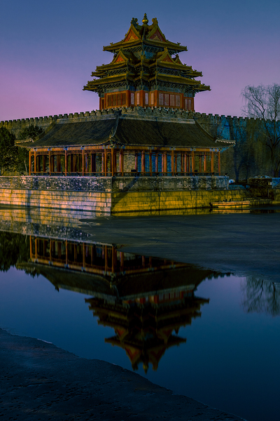 Northwestern tower of the Forbidden City Palace Museum in Beijing China by Mirko Kuzmanovic