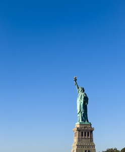 Statue of Liberty with bright blue sky