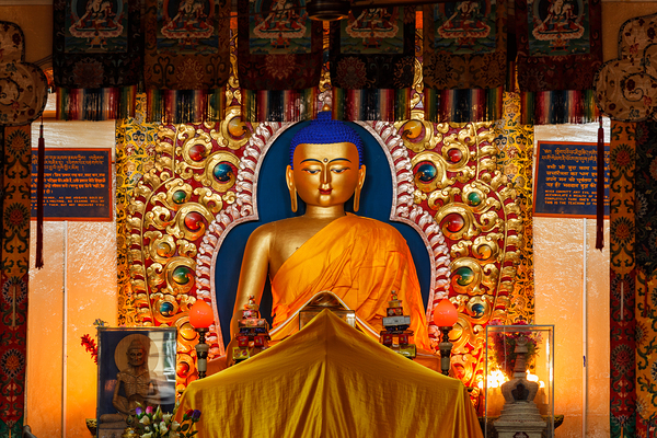 Gilded statue of Sakyamuni Buddha in Tsuglagkhang temple by Dmitry Rukhlenko