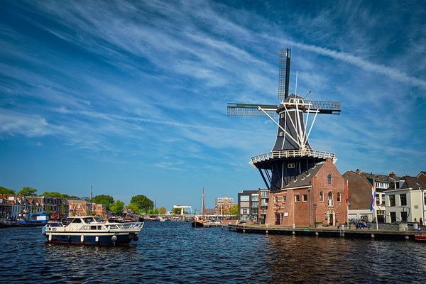 Harlem landmark windmill De Adriaan on Spaarne river. Harlem by Dmitry Rukhlenko