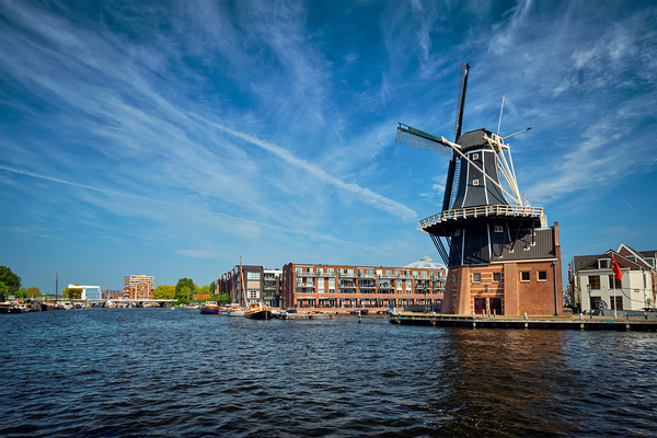 Harlem landmark windmill De Adriaan on Spaarne river. Harlem by Dmitry Rukhlenko