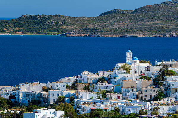 View of Plaka village with traditional Greek church. Milos island Greece by Dmitry Rukhlenko