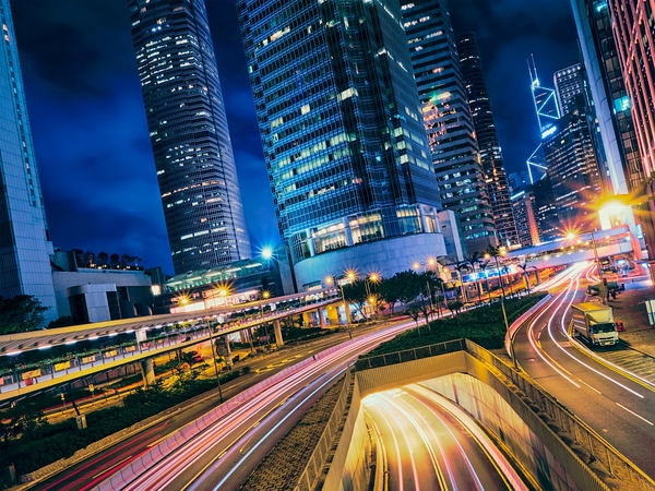 Street traffic in Hong Kong at night by Dmitry Rukhlenko