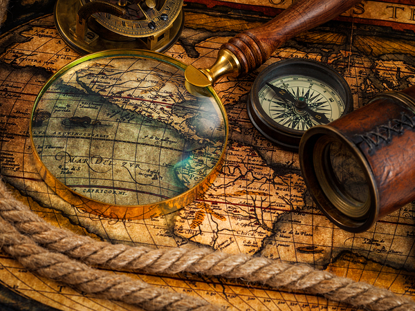 Old vintage compass and navigation instruments on ancient map by Dmitry Rukhlenko