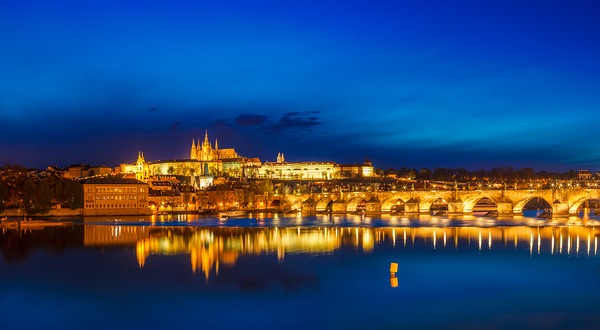 View of Charles Bridge Karluv most and Prague Castle Prazsky hrad in twilight. Panorama Print