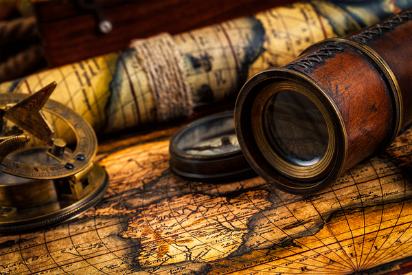 Old vintage compass and navigation instruments on ancient map by Dmitry Rukhlenko