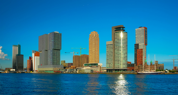 Rotterdam skyscrapers skyline view over of Nieuwe Maas river. Rotterdam by Dmitry Rukhlenko