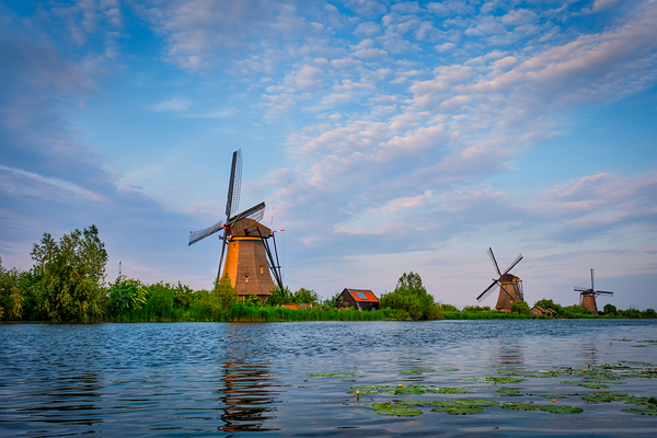 Windmills at Kinderdijk in Holland. Netherlands by Dmitry Rukhlenko