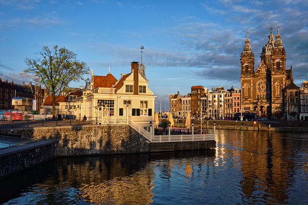 Tourist information center Amsterdam canal and Church of Saint by Dmitry Rukhlenko