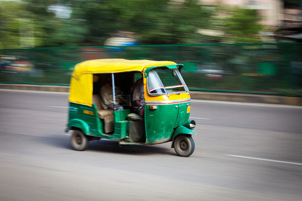 Indian auto autorickshaw in the street. Delhi India by Dmitry Rukhlenko