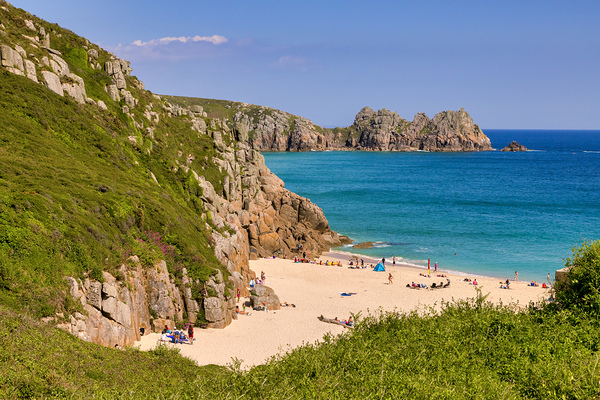 Porthcurno Beach and Logan Rock Cornwall UK by Travelling Light