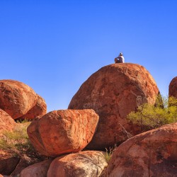 Devils Marbles and Man in a Hat