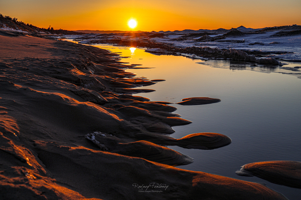 March Lake Superior Sunset by Rodney Pentoney