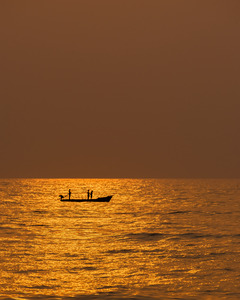 The Sun Melting into the oceans embrace | Silhouette | Sunrise 