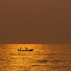 The Sun Melting into the oceans embrace | Silhouette | Sunrise 