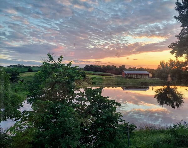 Farmland at sunset by Missouri Micky