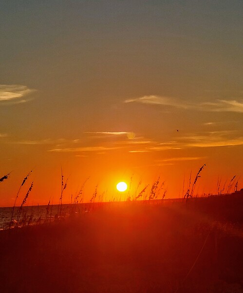Sunset at the beach by Missouri Micky