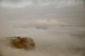 Mesa Edge Pushing Through Clouds