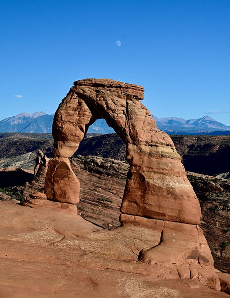 Delicate Arch W Moon by Tom Fritz