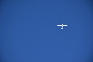 A plane in a blue sky