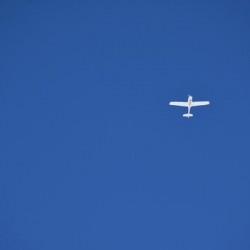 A plane in a blue sky