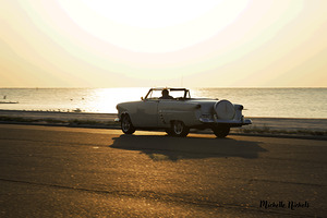 White Classic Convertible On The Beach