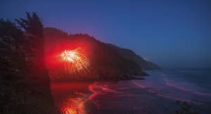 Fireworks erupting from the beach along the Oregon Coast; Oregon, United States of America