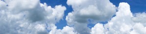 Clouds in a blue sky; Alberta, Canada