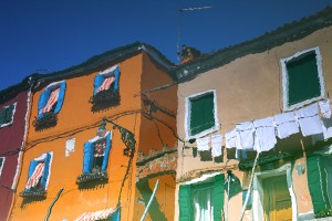 Reflections In Water Of Burano, Italy