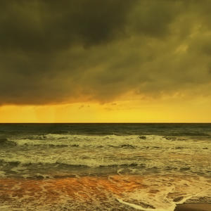 Waves Breaking On A Wintery Beach At Dawn; Spain