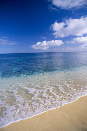 Wave Washes Ashore Onto Sandy Beach, Azure Ocean, Blue Sky B1498