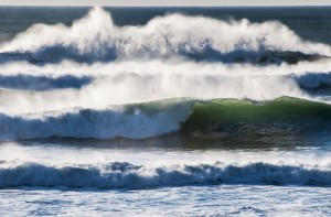 Waves break on the shore; Cannon Beach, Oregon, United States of America