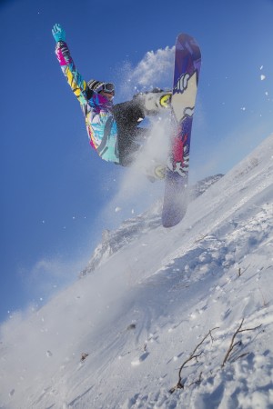 Native Alaskan youth snowboarding in Anaktuvuk Pass, Gates of the Arctic National Park, Brooks Range, Arctic Alaska
